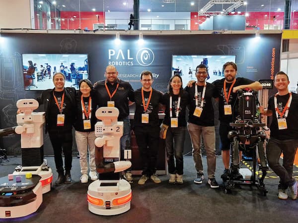 PAL Robotics' team at the ICRA 2023 conference discussing the project PILLAR-Robots with the robotic solutions including the latest generation mobile manipulator TIAGo Pro, the AMR ARan, the AI social robot ARI and the biped Kangaroo robot.
